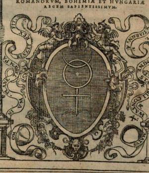 The 'Hieroglyphic Monad' (Monas Hieroglyphica) symbol, a composite glyph designed by John Dee representing the unity of the cosmos through alchemical and astrological components (Sun, Moon, elements, and Aries). It is enclosed in an oval frame surrounded by Latin scrolls.